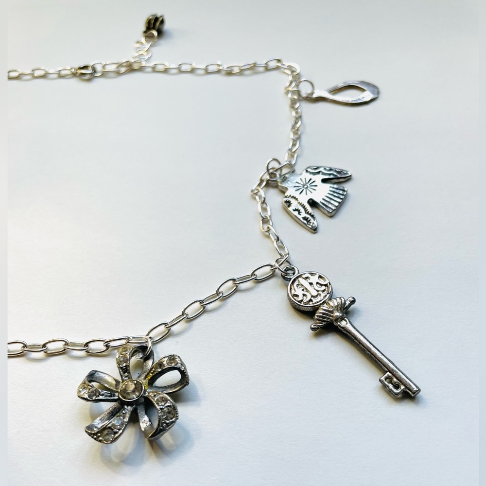 Silver Found Object Charm Necklace With Peacock Charm - Picture 5 of 6